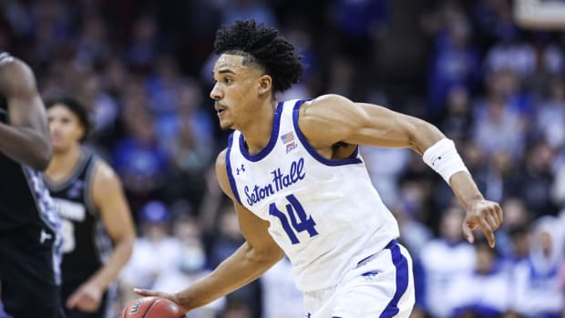 Mar 2, 2022; Newark, New Jersey, USA; Seton Hall Pirates guard Jared Rhoden (14) dribbles up court against the Georgetown Hoyas during the second half at Prudential Center. Mandatory Credit: Vincent Carchietta-USA TODAY Sports